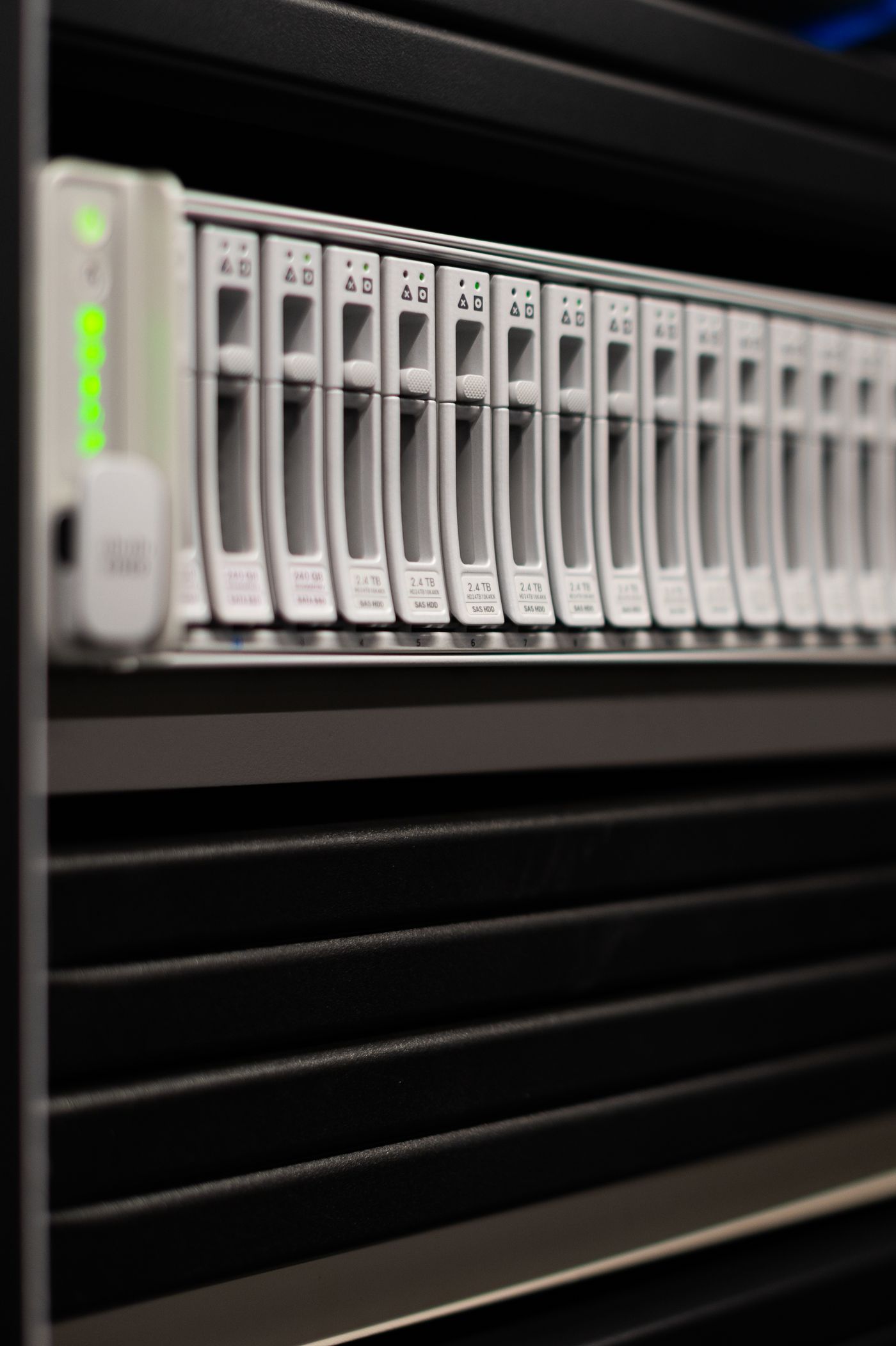 Close-up of storage drives in a server rack
